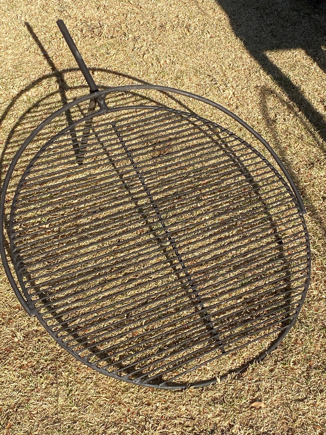 Adjustable cooking grid for Bluestone pit fires